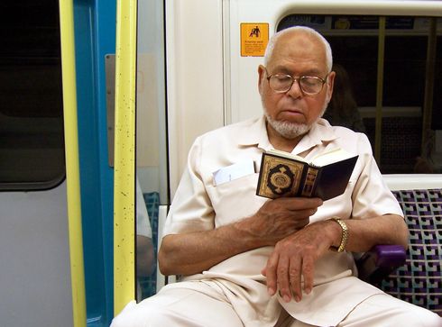 Reading a book in the subway